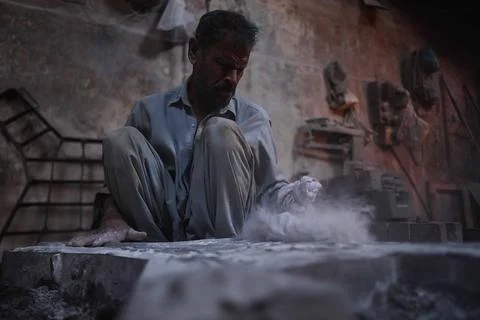 Pakistani workers at an iron die-casting factory in Karachi, Pakistan - 10 Sep 2 Stock Photos