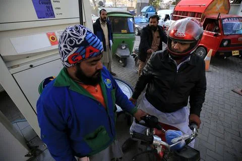 Pakistan's government decrease petrol price by Rs 5 per liter (0.028 USD), Pesha Stock Photos