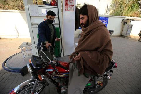 Pakistan's government decrease petrol price by Rs 5 per liter (0.028 USD), Pesha Stock Photos