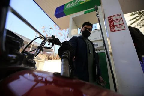 Pakistan's government decrease petrol price by Rs 5 per liter (0.028 USD), Pesha Stock Photos