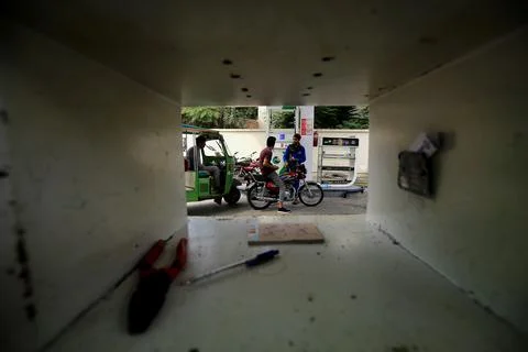 Pakistan's government decrease petrol price by Rs 12.63 per liter (0.055 USD), P Stock Photos