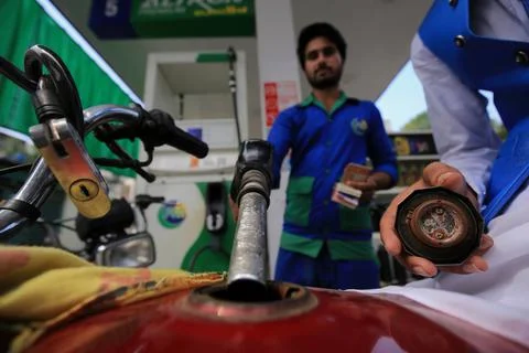 Pakistan's government decrease petrol price by Rs 12.63 per liter (0.055 USD), P Stock Photos