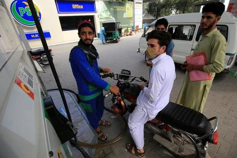 Pakistan's government decrease petrol price by Rs 12.63 per liter (0.055 USD), P Stock Photos
