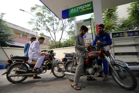 Pakistan's government decrease petrol price by Rs 12.63 per liter (0.055 USD), P Stock Photos