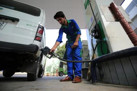 Pakistan's government decrease petrol price by Rs 12.63 per liter (0.055 USD), P Stock Photos
