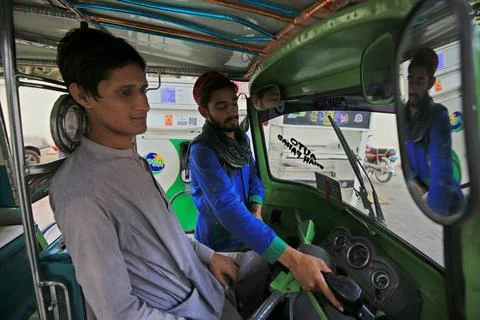 Pakistan's government decrease petrol price by Rs 12.63 per liter (0.055 USD), P Stock Photos