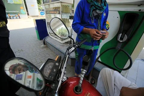 Pakistan's government decrease petrol price by Rs 12 per liter (0.042 USD), Pesh Stock Photos