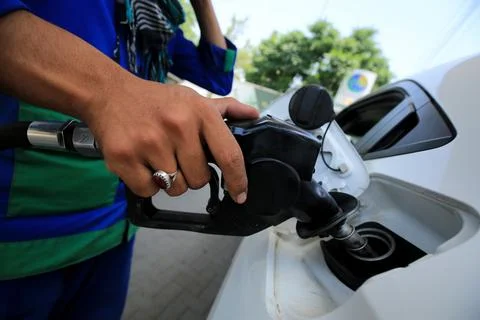 Pakistan's government decrease petrol price by Rs 12 per liter (0.042 USD), Pesh Stock Photos