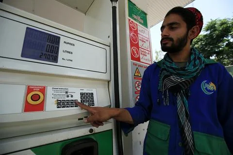 Pakistan's government decrease petrol price by Rs 12 per liter (0.042 USD), Pesh Stock Photos