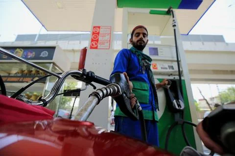 Pakistan's government decrease petrol price by Rs 12 per liter (0.042 USD), Pesh Stock Photos