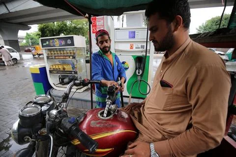 Pakistan's government decrease petrol price by Rs 8 (0.028 USD) per liter, Pesha Stock Photos