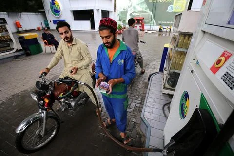 Pakistan's government decrease petrol price by Rs 8 (0.028 USD) per liter, Pesha Stock Photos