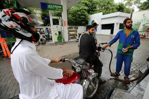 Pakistan's government decrease petrol price by Rs 8 (0.028 USD) per liter, Pesha Stock Photos