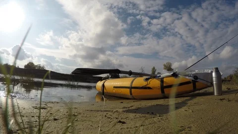 Pakraft on the shore, timelapse, river Stock Footage 116859909
