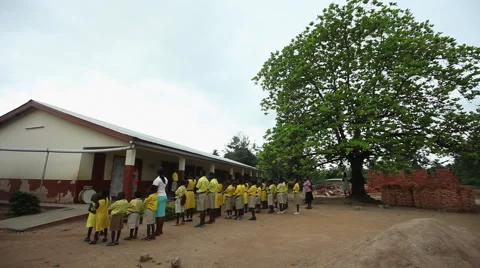 PAKRO MORNING ASSEMBLY STUDENTS PRAY OTHERS ARRIVE Stock Footage 59735150