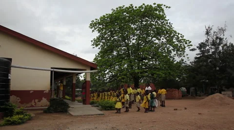 PAKRO MORNING ASSEMBLY YOUNG STUDENTS MARCH TO CLASS Stock Footage 59735146