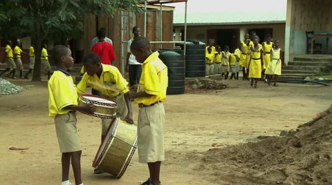 PAKRO STUDENTS AT MORNING ASSEMBLY DRUM AND MARCH Stock Footage 58026657