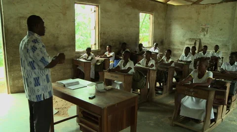 PAKRO TEACHER LECTURES TO STUDENTS IN CLASSROOM Stock Footage 58026687