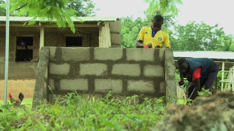 PAKRO WORKERS BUILDING A WALL Stock Footage 58026714