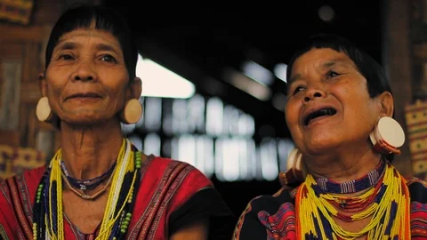 Pakse, Laos. Two Laven Ethnic Tribe Women with huge circular earings. Video stock 111282053