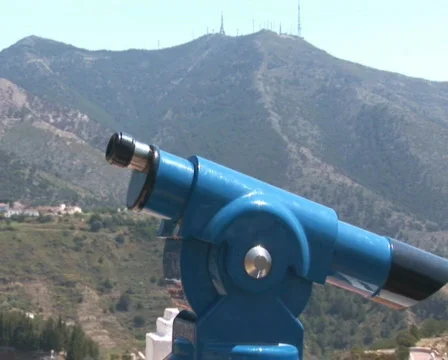 PAL: Man looking through telescope Stock Footage 590519