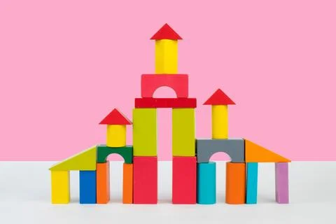 Palace from blocks of children's constructor on a pink background Stock Photos