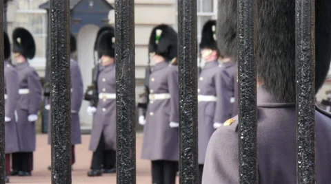 Palace guards wearing black feathery hat Stock Footage 53755325