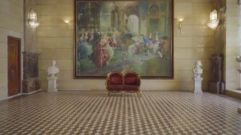 Palace interior hall set reveal shot tracking back from couch 库存影片 332920745