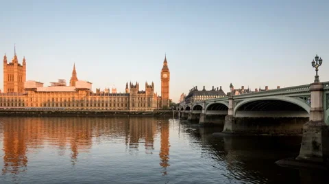 Palace of Westminster, Big Ben and Westminster Bridge London at dawn, time lapse Stock Footage