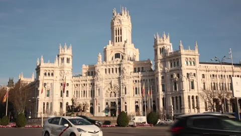 Palacio de Cibeles post office on the corner of Calle Alcala at sunset in Madrid Stock Footage 142645423