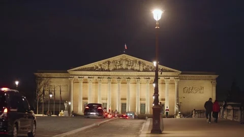Palais Bourbon at night, from Pont de la Concorde Seine River in Paris Stock Footage 275862755