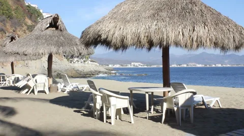 Palapas on a beach in Mexico Stock Footage 1071546