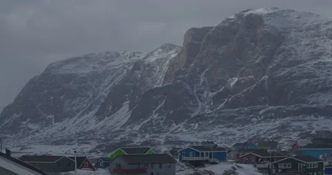 Palasip Qaqqaa mountain in dramatic lighting Stock Footage 218193024