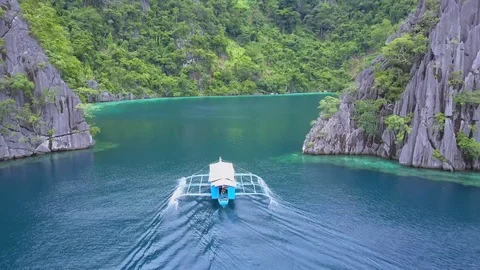 Palawan coron twin lagoon boat driving entrance Stock Footage