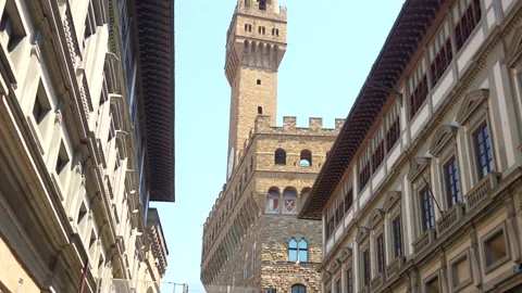 Palazzo Vecchio tower framed by Renaissance buildings Florence Italy Stock Footage 314830296