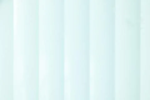 Pale blue abstract background with soft vertical stripes Stock Photos