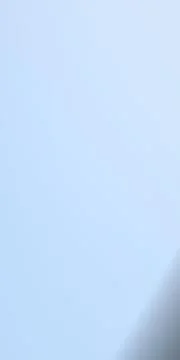 Pale blue abstract gradient background with a subtle darker shadow along th.. Stock-Illustration