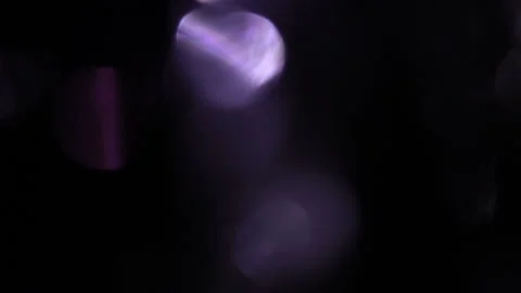 Pale blue bokeh effect of light in the dark Видео 309236306