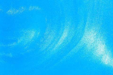 Pale blue liquid background with small pearlescent luminous particles. 스톡 사진