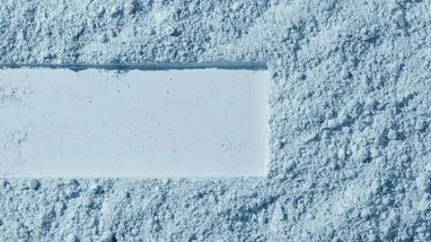Pale blue powder surface with dragged shape and dynamic shadows Stock Footage 337470113
