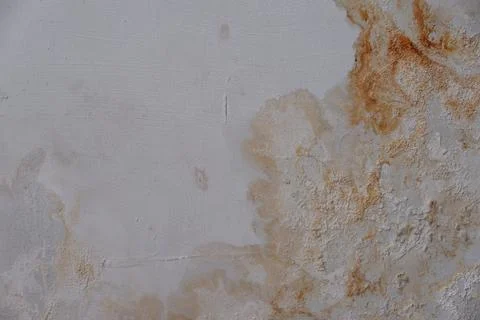 Pale Gray Weathered Wall Texture with Rust and Peeling Surface Stock Photos