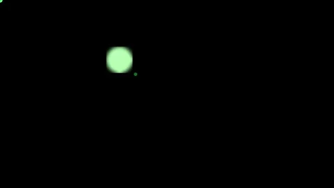 Pale green glowing spheres floating abstractly in dark space with subtle mo.. Stock Footage 340940983