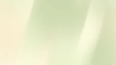 Pale green gradient background features subtle light vertical streaks. Stock Footage 292884327