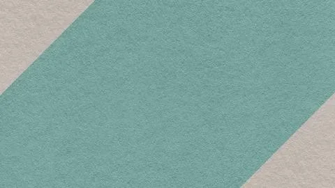 Pale teal paper texture background with light beige corners and copy space .. 库存照片