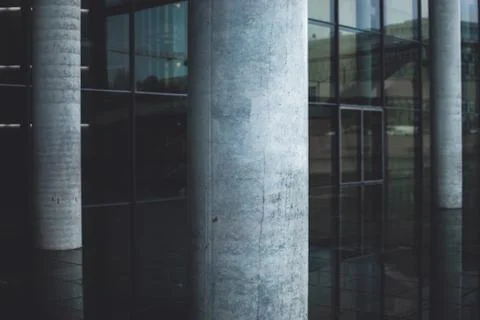 Pale white-blue concrete columns near German Chancellery. Stock Photos