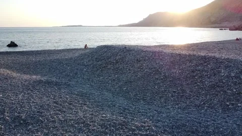 Paleochora pebble beach from top Stock Footage 290033294
