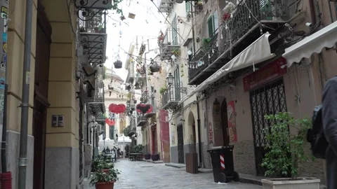 Palermo Couple Walking Down Narrow Street. Stock Footage 328478208