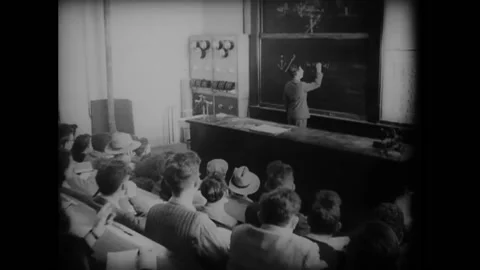 PALESTINE - 1945 - Students attend a math lecture at Palestine's Hebrew Stock Footage 272361952
