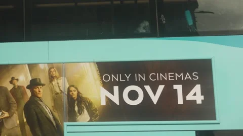 Palestine Flags at Protest in Brighton City Center with Bus Passing in Front. Stock Footage 320617444