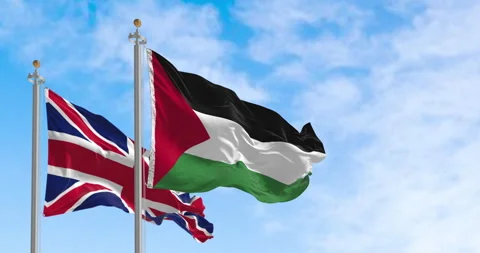 Palestinian and British flags waving side by side Stock Footage 316830232